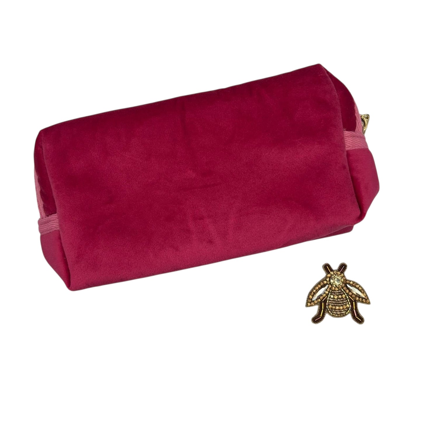 Bright pink makeup bag with Jewelled Insect brooch