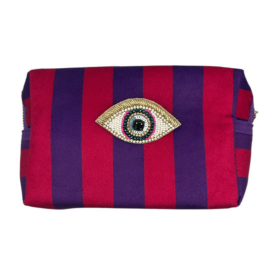 Large purple stripe makeup bag with Golden Eye brooch